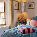 Kip & Co Plum Jam Velvet Cushion showcasing soft velvet fabric in rich plum color with decorative stitching.