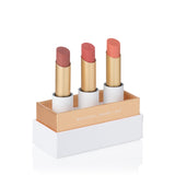 Lük Beautifood Lip Nourish Trio featuring three nude-toned lip balms in sleek packaging, perfect for natural, hydrated lips.