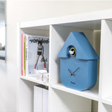 Blue Fisura cuckoo clock with a classic design, featuring a wooden case and traditional clock face with cuckoo bird detail.