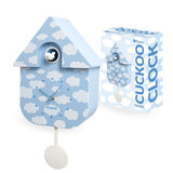 Fisura cuckoo clock with cloud-shaped design and wooden finish, showcasing intricate details and a classic clock face.
