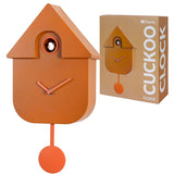 Terracotta Fisura cuckoo clock with traditional design and wooden accents, featuring a small bird figure on the clock face.