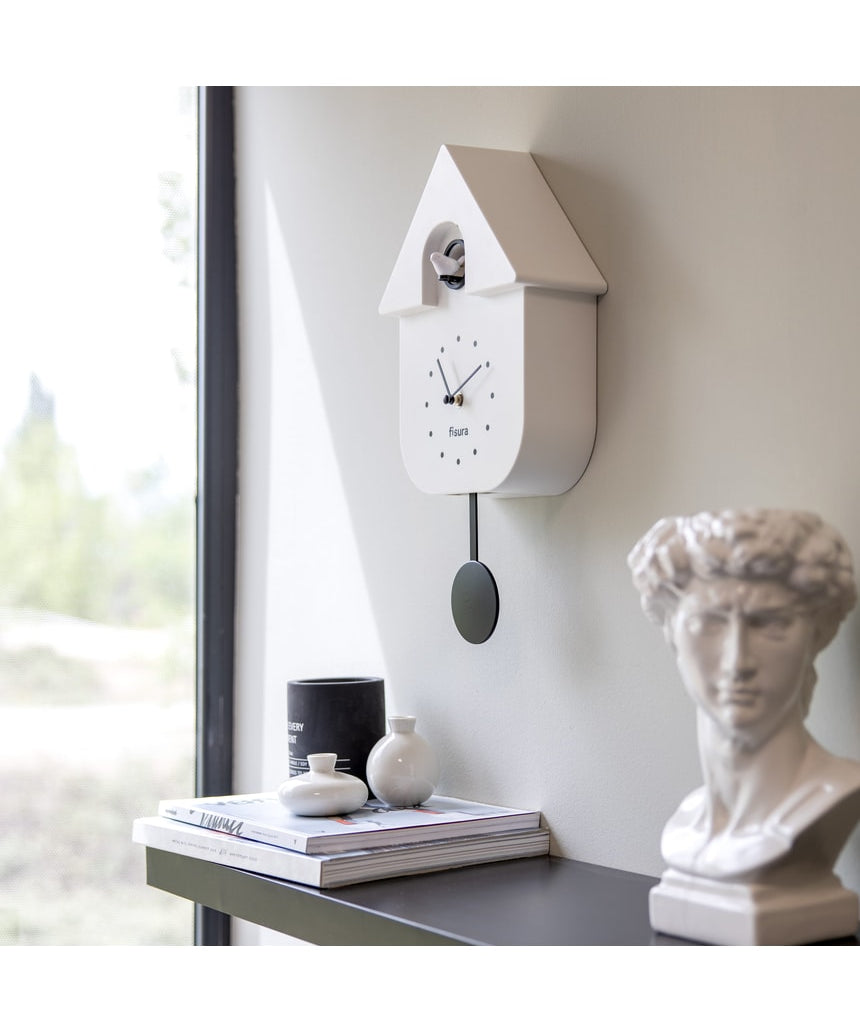 White Fisura Cuckoo Clock with traditional design and wooden details, featuring a small cuckoo bird on the front.