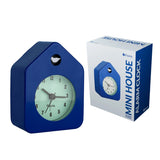 Blue Fisura Little House alarm clock with a charming house design, featuring clock face and decorative details.