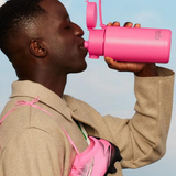 Frank Green drinkwear switch lid with straw and strap, featuring a blush-colored lid for reusable bottles and eco-friendly use.