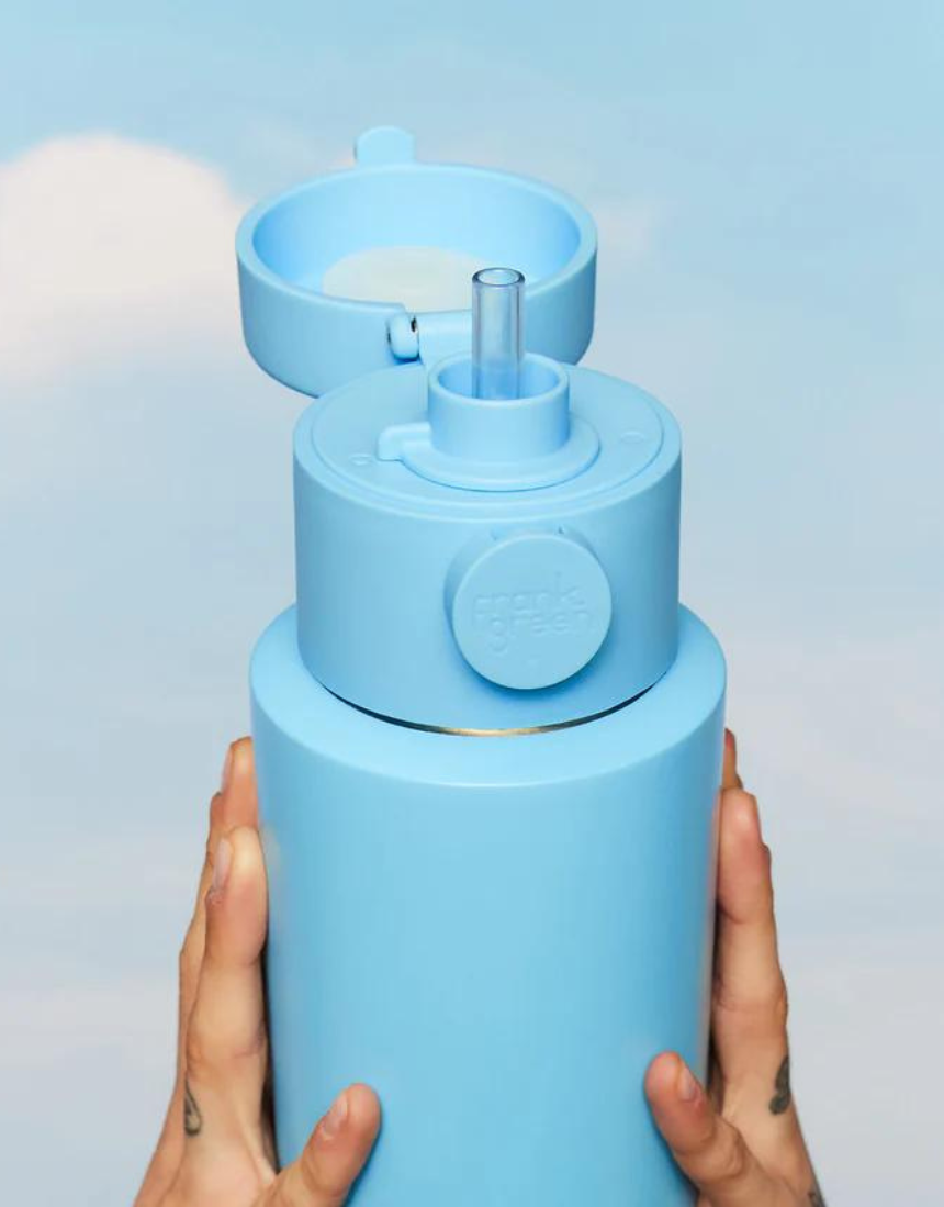 Frank Green drinkwear switch lid with straw and strap in blush color, featuring a secure fit and convenient carry strap.