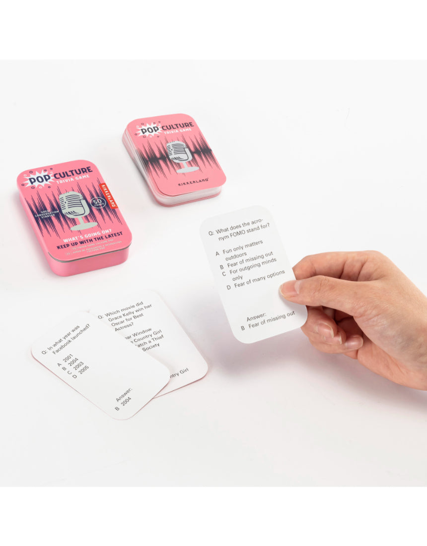 Close-up of the isAlbi Pop Culture Trivia game box showing colorful graphics and game components on a white background.
