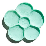 Greenwood Designs flower-shaped jewellery tray in mint color, designed for organizing rings, necklaces, and small accessories.