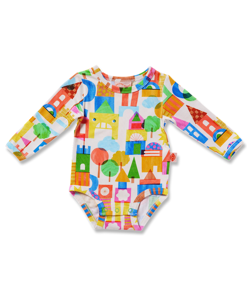 Baby long sleeve bodysuit by Halcyon Nights featuring a castle of dreams design, suitable for ages 0-3 months.