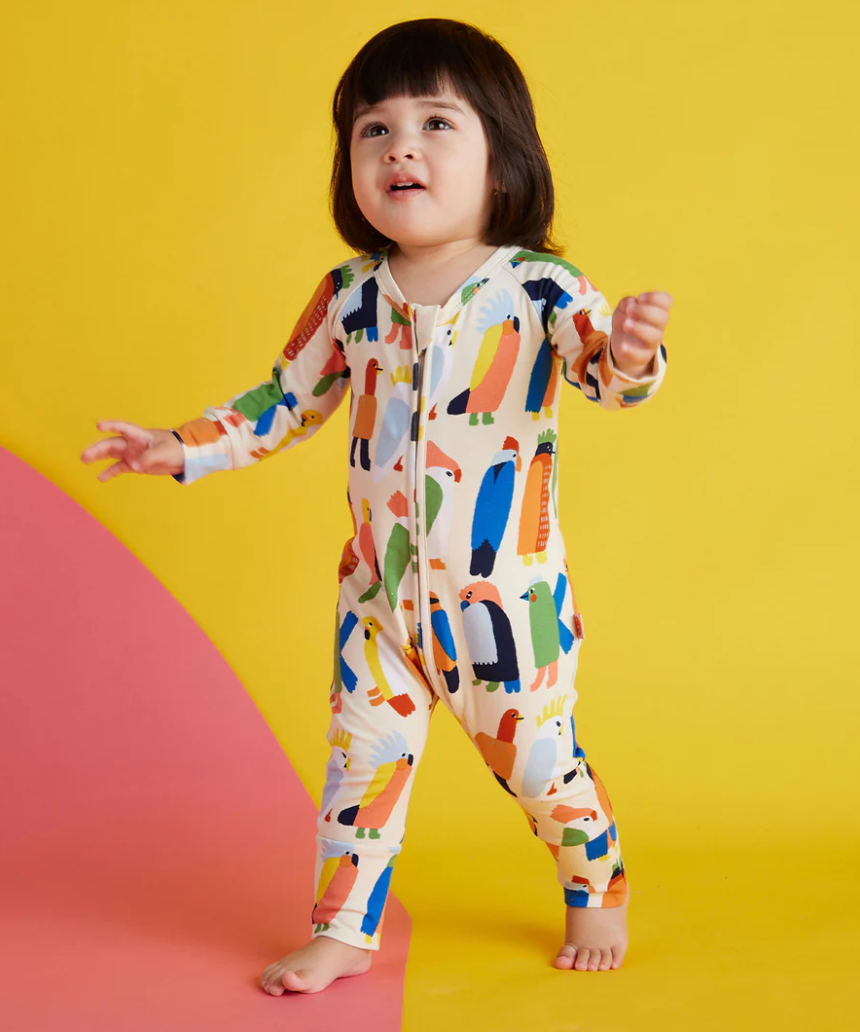 Baby Halcyon Nights Flamin' Galahs long sleeve zip suit with vibrant bird print, designed for newborns.
