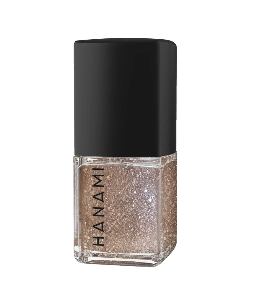 Hanami Dancing On My Own nail polish bottle by Hanami Cosmetics with vibrant pink and purple shades.