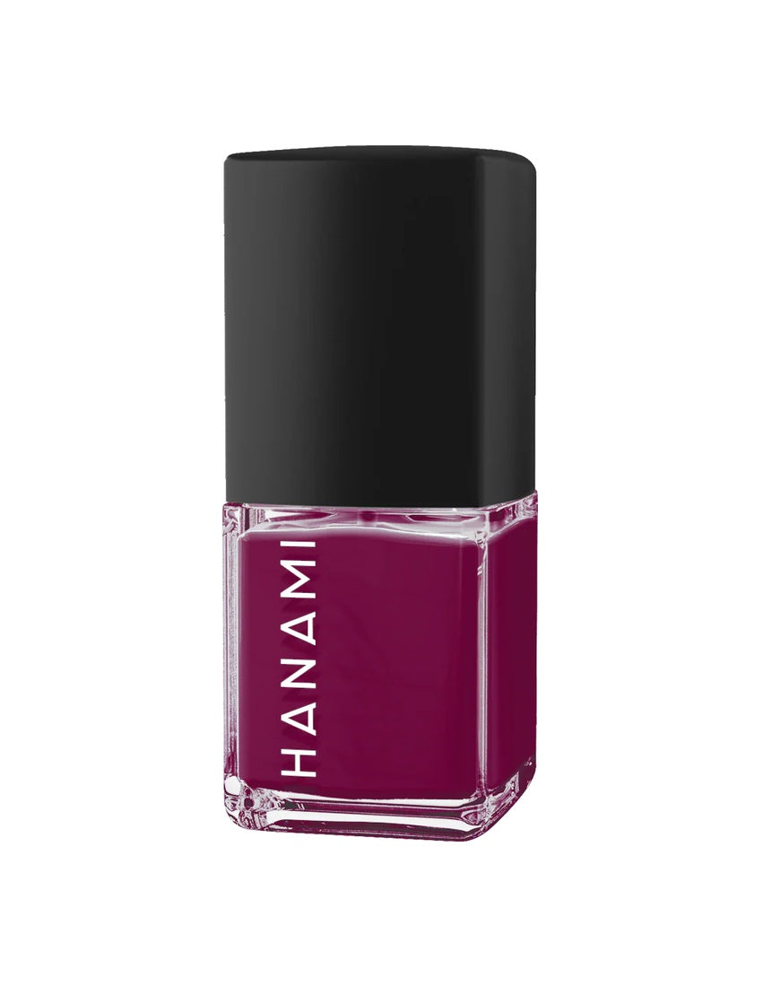Hanami Doria nail polish bottle by Hanami Cosmetics with vibrant pink color and elegant packaging.