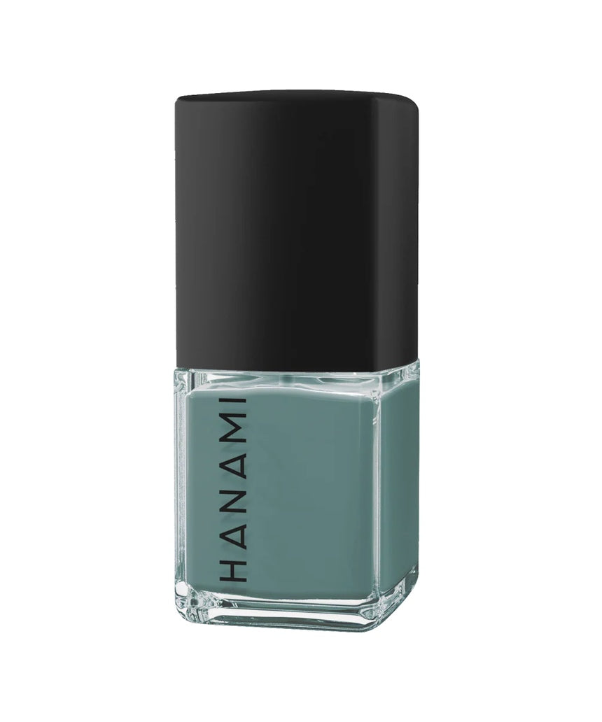 Hanami Cosmetics Still nail polish bottle with pastel pink color and elegant label, displayed on a white background.
