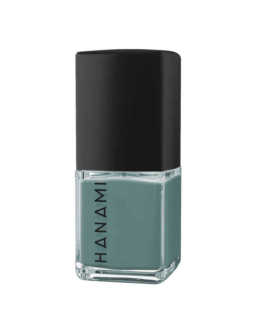 Hanami Cosmetics Still nail polish bottle with pastel pink color and elegant label, displayed on a white background.