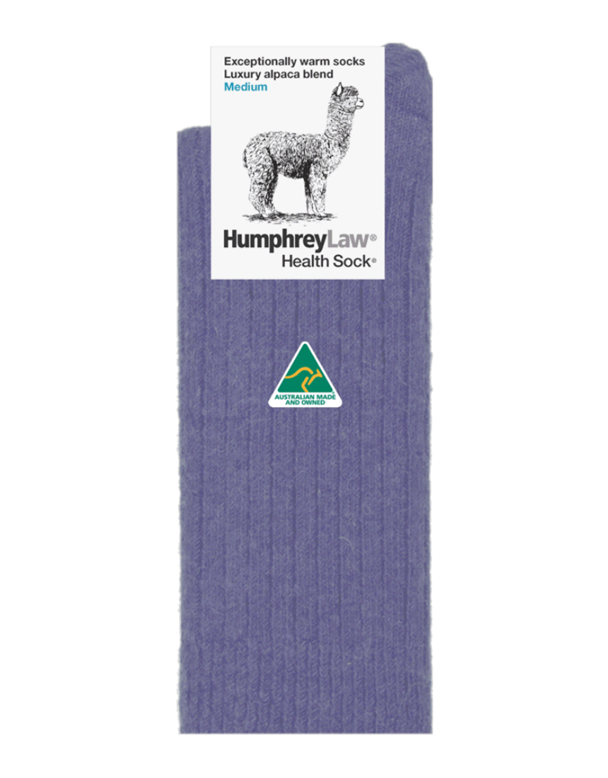 Humphrey Law medium powder pink alpaca socks with cozy, soft knit texture and ribbed cuff detail.
