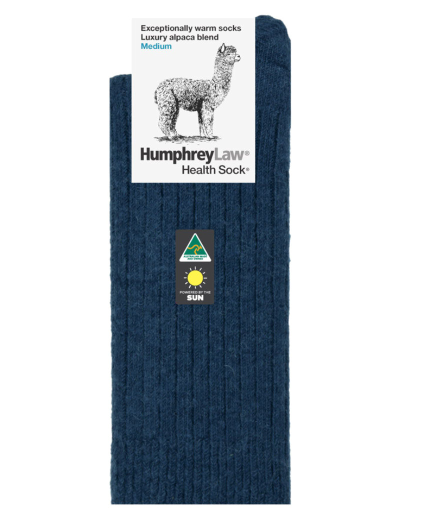 Humphrey Law medium alpaca socks in powder pink, soft and cozy with a comfortable knit pattern.