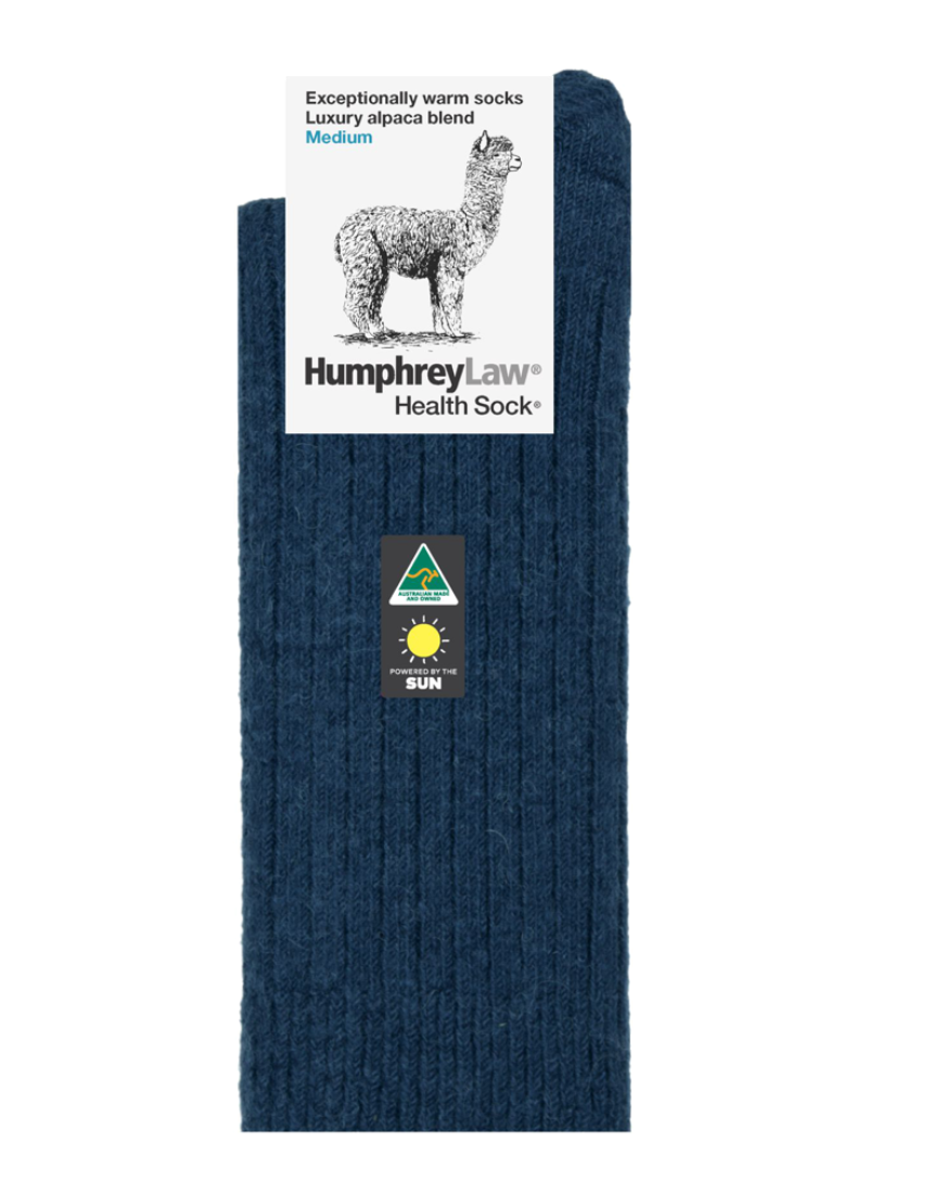 Humphrey Law medium alpaca socks in powder pink, soft and cozy with a comfortable knit pattern.
