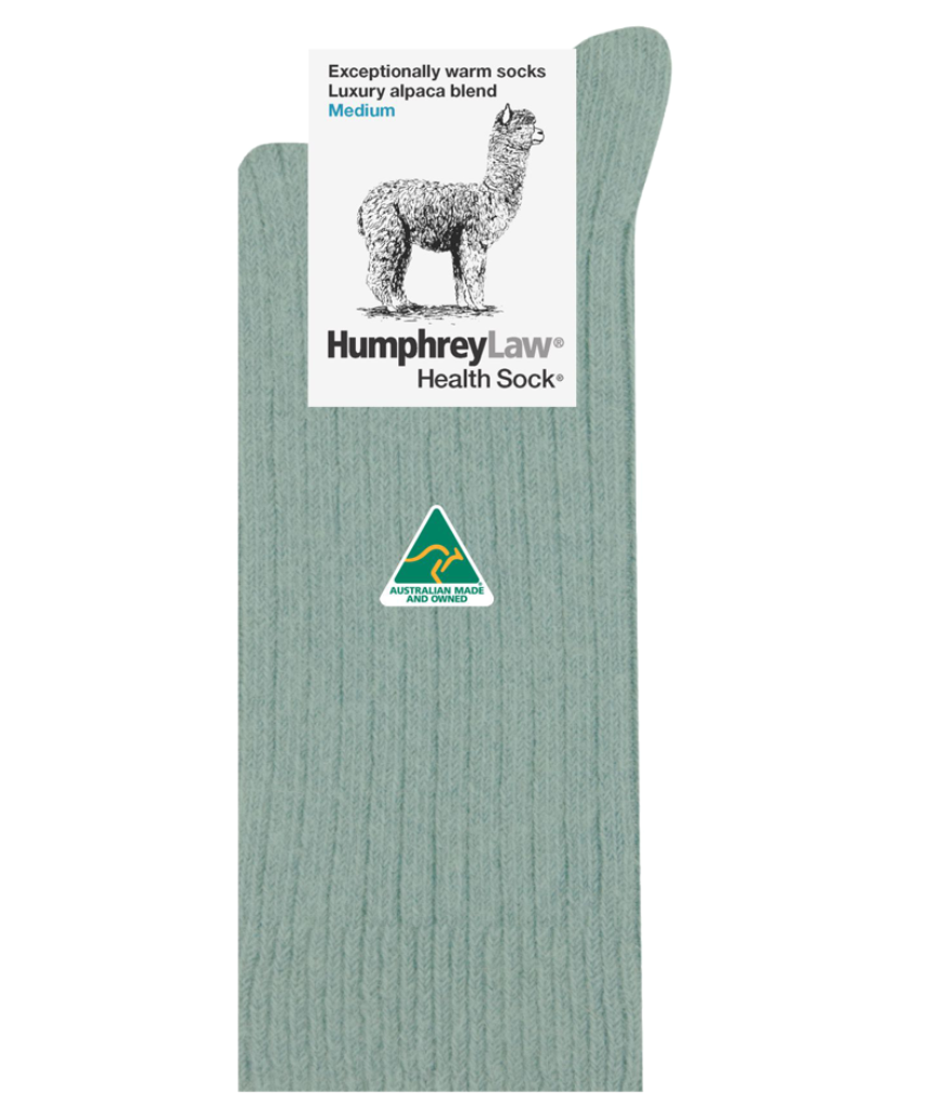 Humphrey Law medium alpaca socks in powder pink, soft knit with cozy, warm texture and ribbed cuff for comfortable wear.