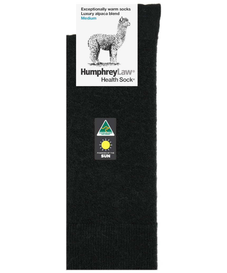 Black baby alpaca socks by Humphrey Law, small size, soft and cozy for delicate baby feet.
