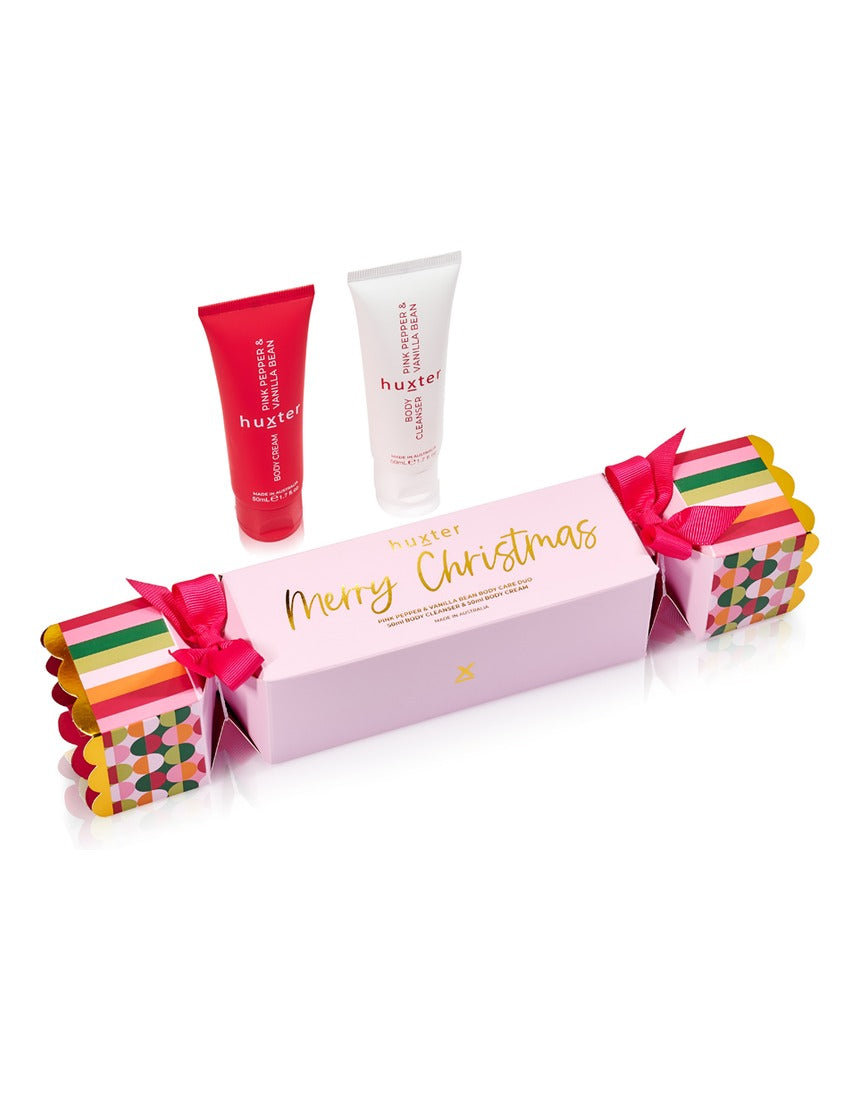 Huxter Christmas Body Care Bon Bon set with pink pepper and vanilla bean, featuring wrapped body care products with festive packaging