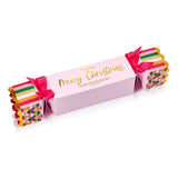Huxter Adorned Christmas Body Care Bon Bon gift set with pink pepper and vanilla bean, featuring wrapped body care products in festive packaging.