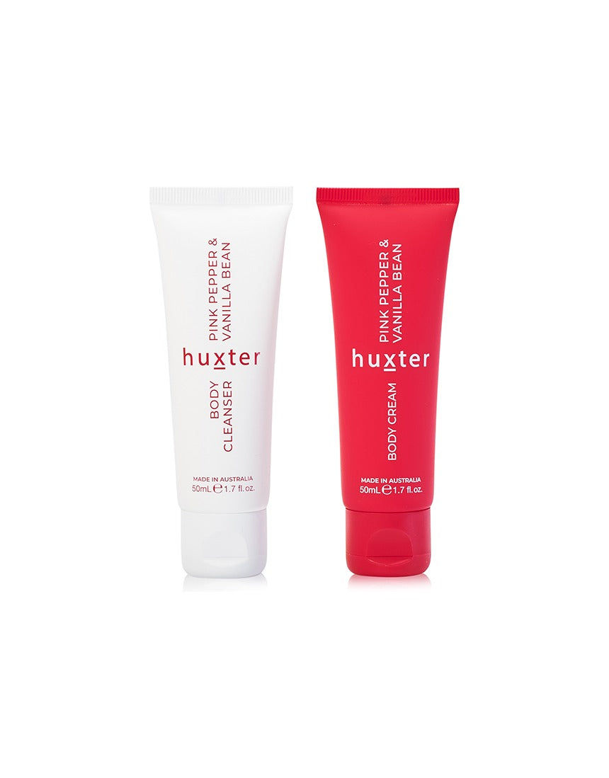 Huxter Adorned Christmas Body Care Bon Bon gift set with pink pepper and vanilla bean, featuring assorted body care products in festive packaging.