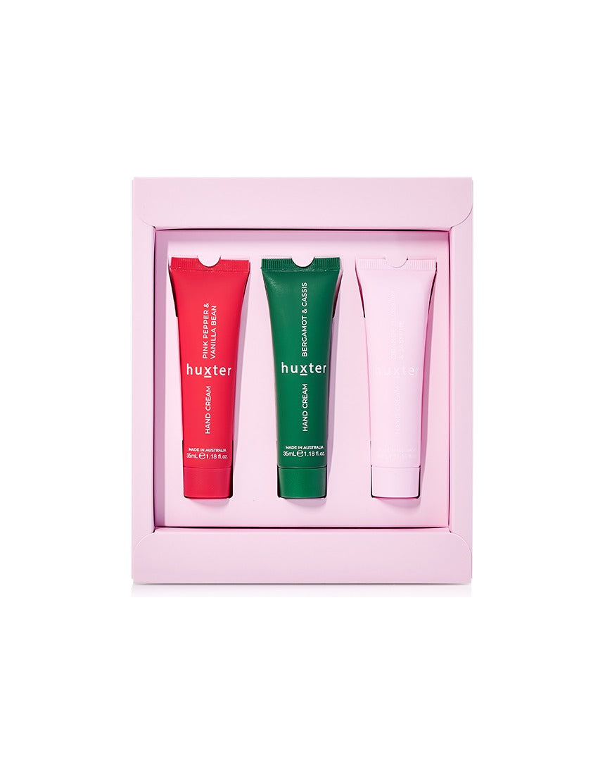 Huxter Adorned Christmas Hand Cream Gift Set with three festive scented hand creams arranged in decorative packaging.