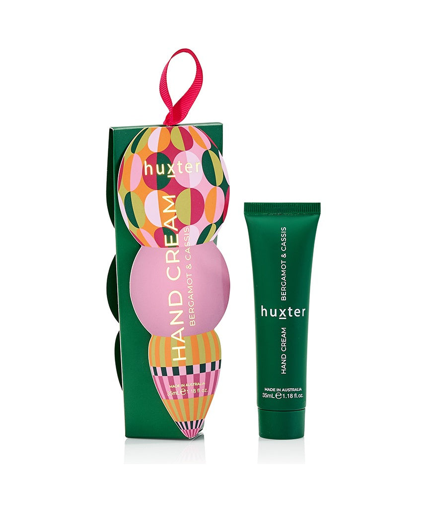 Huxter Adorned Christmas Hanging Hand Cream in green with festive holiday design and decorative ribbon.
