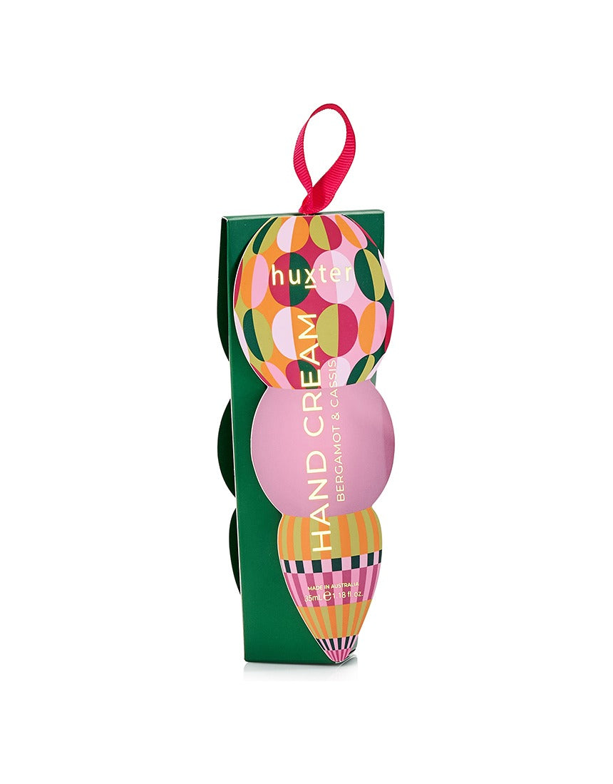 Huxter Adorned Christmas Hanging Hand Cream in green with festive design, featuring a decorative hanging ornament for holiday skincare.