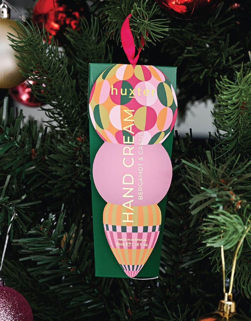 Green Huxter Adorned Christmas Hanging Hand Cream with festive packaging, perfect for holiday gift-giving.