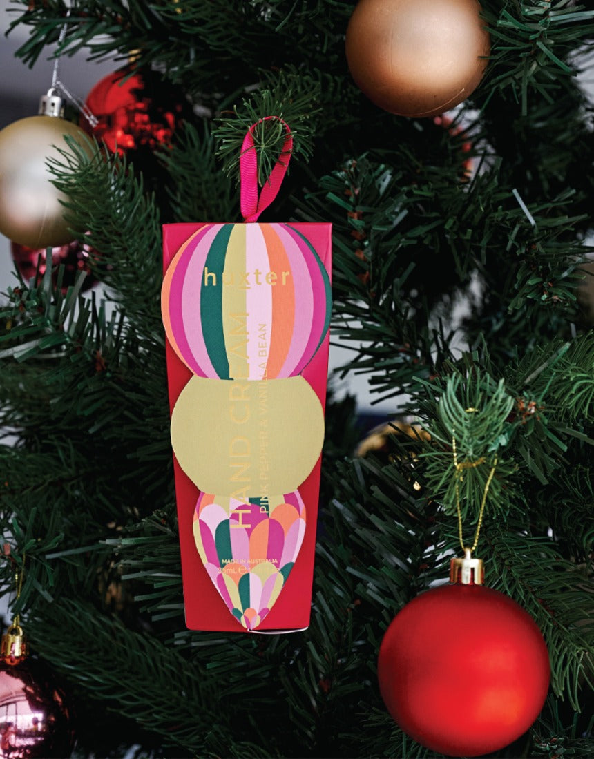 Huxter Adorned Christmas hanging hand cream bottle with mulberry scent, featuring festive holiday packaging.