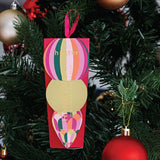 Huxter Adorned Christmas hanging hand cream bottle with mulberry scent, featuring festive holiday packaging.