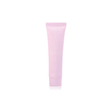 Huxter Adorned Christmas hanging hand cream in soft pink with festive design, displayed on a decorative surface.