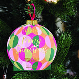 Huxter Adorned Christmas Hanging Lip Balm in green, decorative holiday-themed lip balm with hanging string, festive season skincare.