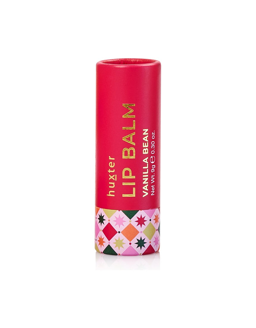 Huxter Adorned Christmas Hanging Lip Balm in soft pink with festive holiday design and packaging.