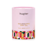 Huxter Adorned Christmas Nourishing Dry Body Oil bottle with decorative label, 50ml, highlighting hydrating skincare.