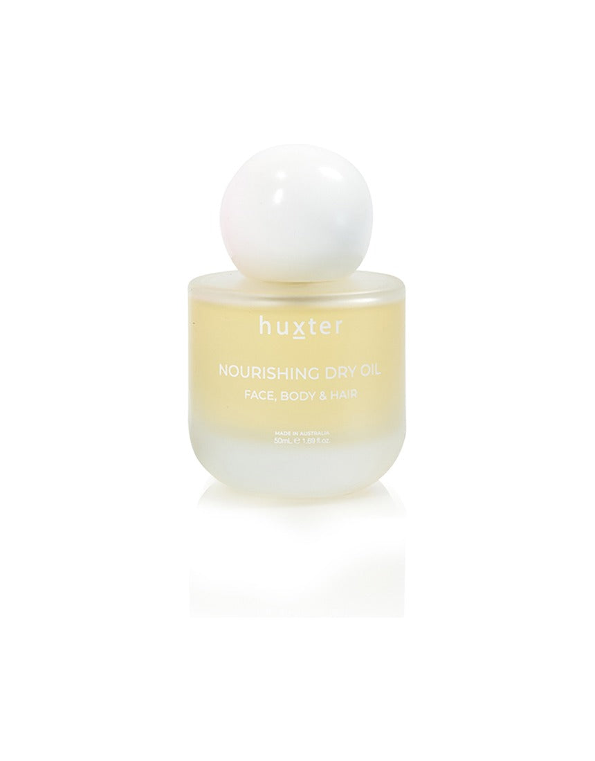 Huxter Adorned Christmas Nourishing Dry Oil 50ml, a luxurious body oil with festive packaging and a nourishing formula.