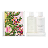 Huxter Adorned Christmas Bath & Body Gift Set with pink pepper and vanilla bean scented wash and lotion bottles.
