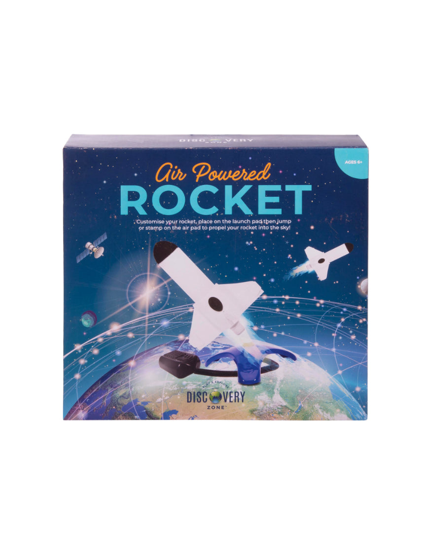 Kids' air powered rocket by isAlbi flying through the air with a blue and orange design against a clear sky.