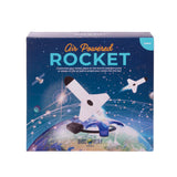 Kids' air powered rocket by isAlbi flying through the air with a blue and orange design against a clear sky.