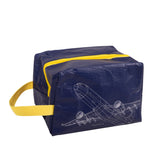 isAlbi Maverick Toiletries Bag in assorted colors, a compact cosmetic and toiletry bag with multiple compartments for travel storage.
