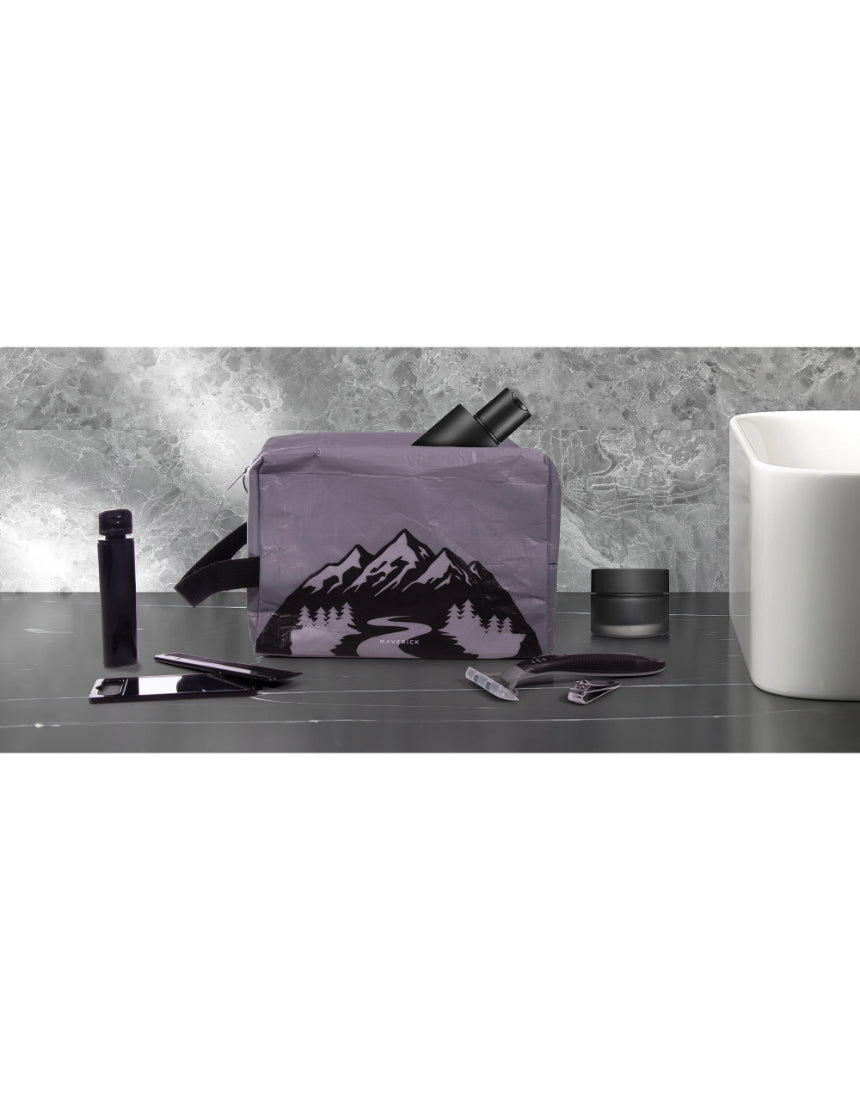 isAlbi Maverick toiletry bag with assorted compartments, ideal for cosmetics and travel essentials.