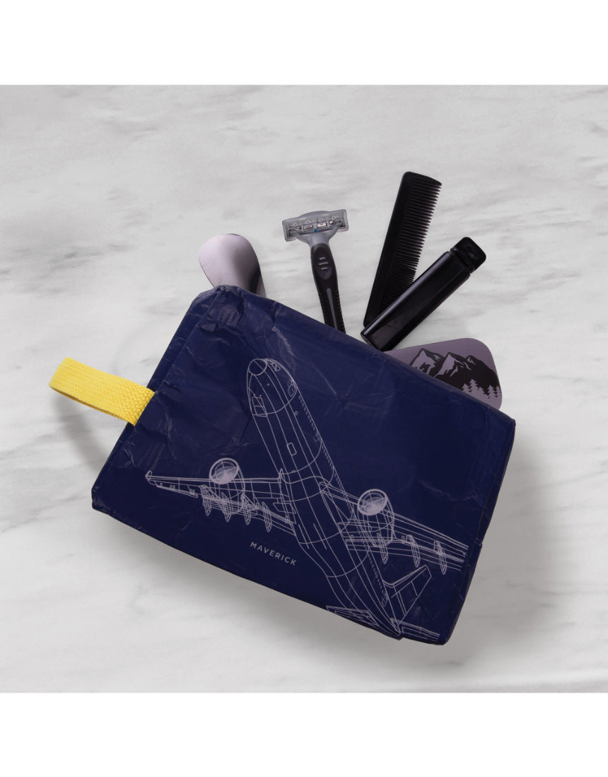 isAlbi Maverick toiletry bag with assorted compartments, designed for cosmetics and toiletries, shown in a sleek, durable style.