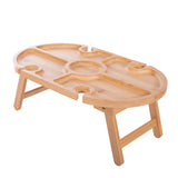 isAlbi mini picnic table with two attached benches, ideal for outdoor dining and small gatherings, made of durable wood.