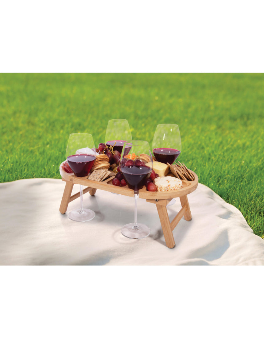Small isAlbi mini picnic table with wooden slats and sturdy legs, ideal for outdoor gatherings and children's play areas.