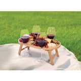 Small isAlbi mini picnic table with wooden slats and sturdy legs, ideal for outdoor gatherings and children's play areas.