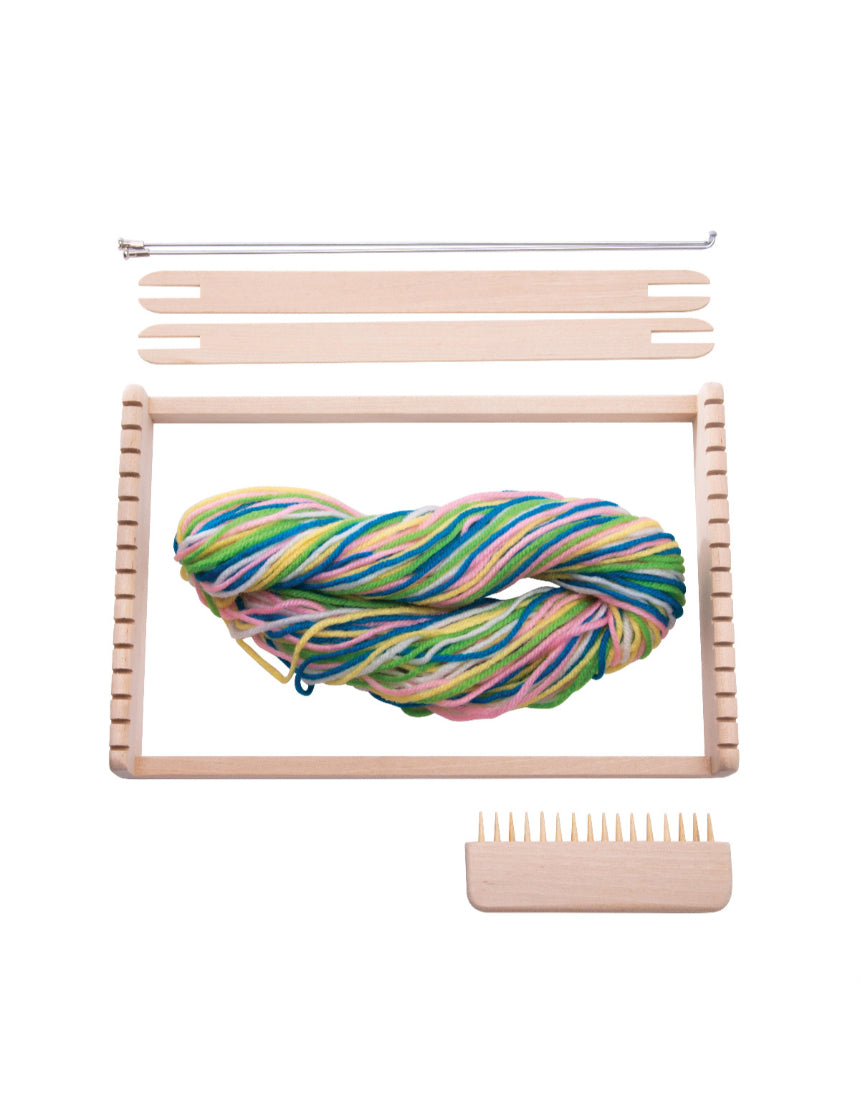 Rainbow wooden weaving loom for picnic crafts by isAlbi, featuring colorful wooden slats and weaving tools on a natural background.