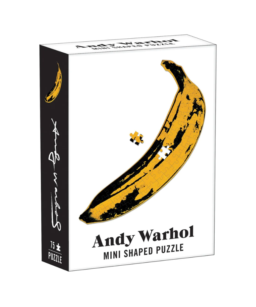 Mini banana puzzle featuring Andy Warhol artwork, by IS Gift, with colorful, abstract design on a small, collectible puzzle piece.