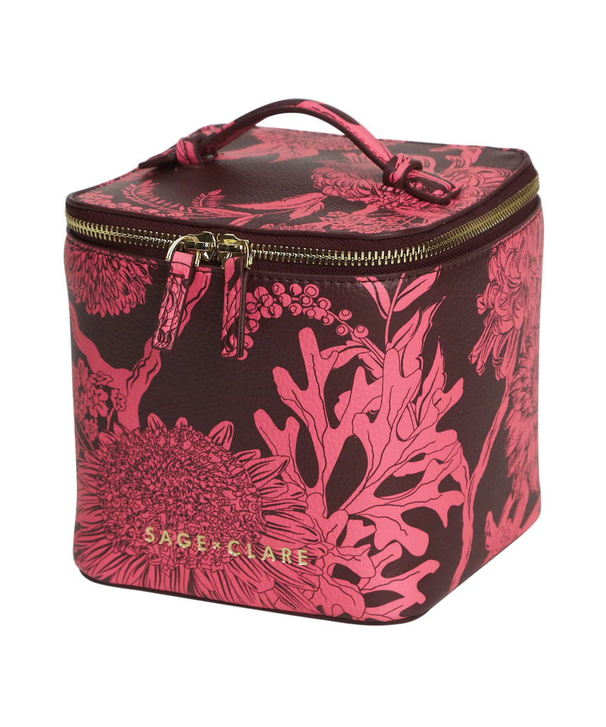 Sage x Clare Delphine Small Vanity Case in Garnet, a stylish cosmetic and toiletry bag with a vibrant red design.
