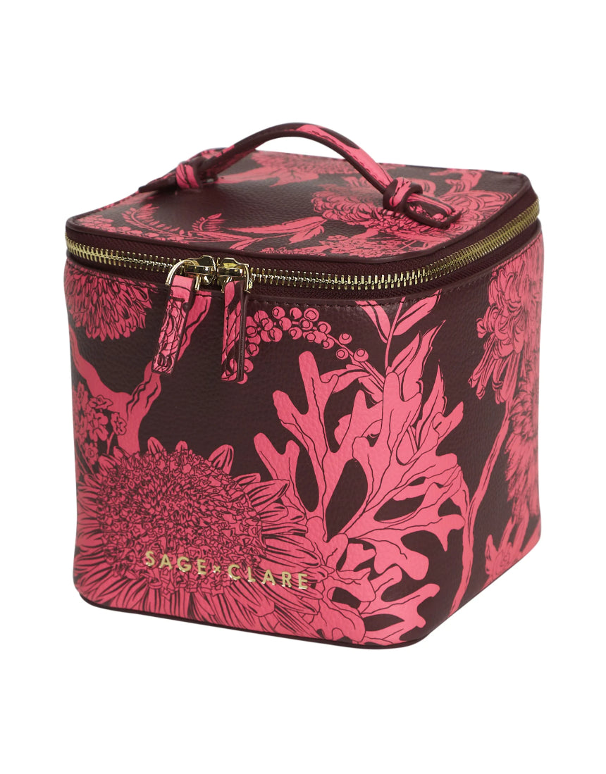Sage x Clare Delphine Small Vanity Case in Garnet, a stylish cosmetic and toiletry bag with a vibrant red design.
