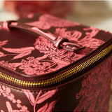 Sage x Clare Delphine small vanity case in garnet with floral pattern, perfect for cosmetics and toiletry storage.